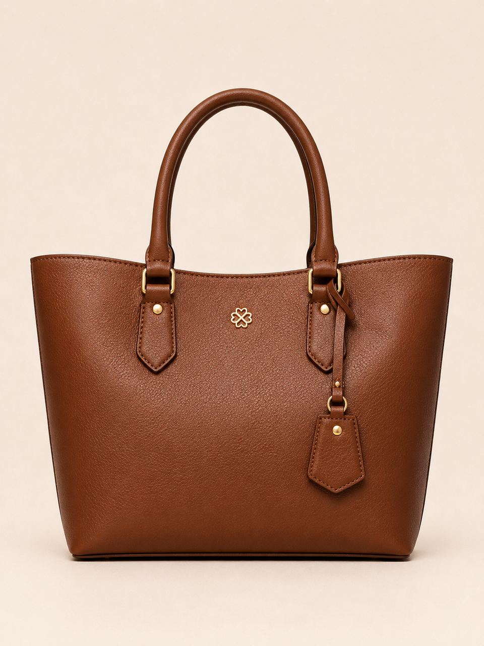 The same tote lit and staged on a studio backdrop